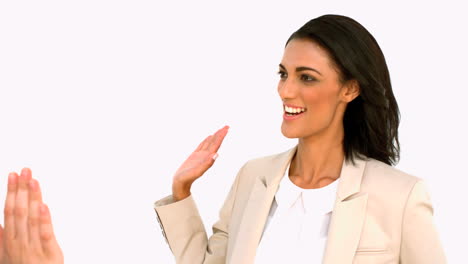 Businesswoman-giving-high-five-