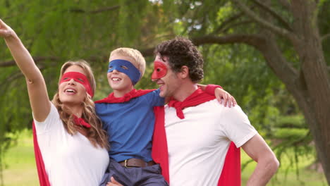 family pretending to be superhero