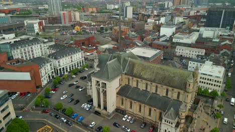 aerial shot of st anne's cathedral in belfast's cathedral quarter in northern ireland