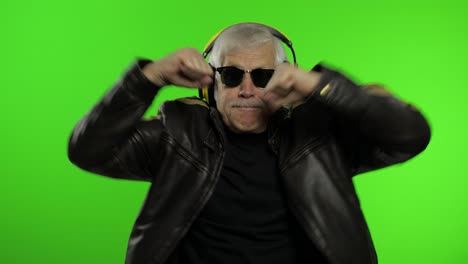 Elderly-senior-caucasian-grandfather-rocker-man-dance,-listen-music.-Chroma-key