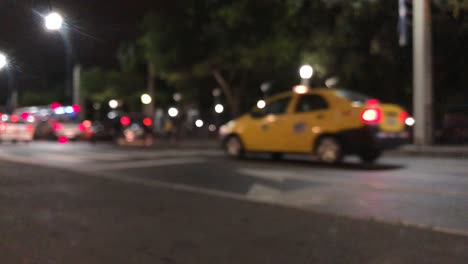 Blurred-scene-of-cars-passing-by-in-a-low-traffic-street-in-Guayaquil,-Ecuador-2