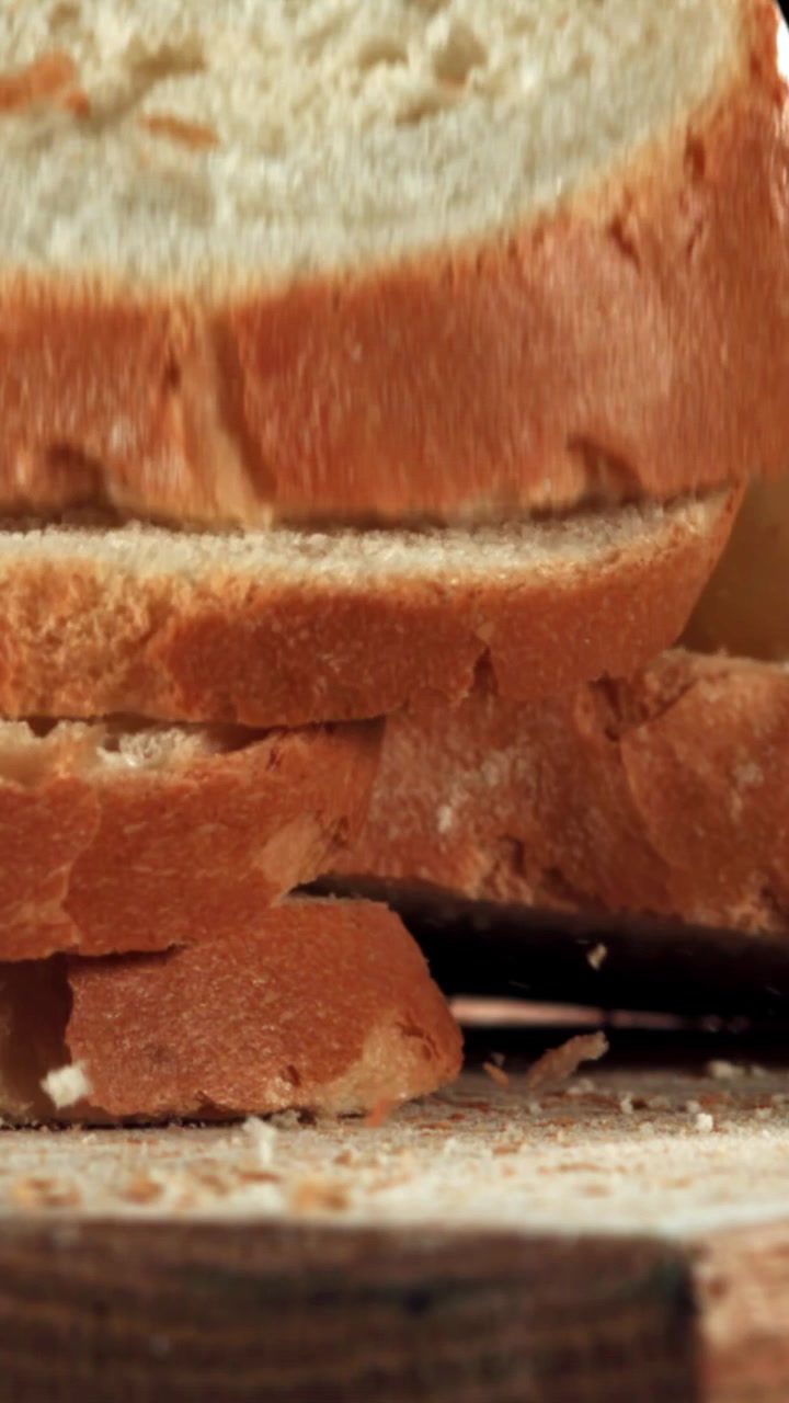Fresh White Bread Slices Falling in Slow Motion