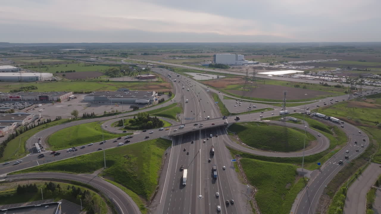 Highway 401 interchange in Mississauga, Canada, showing traffic flow and surrounding landscape