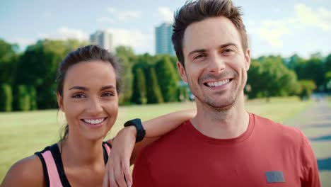 Portrait-of-smiling-couple-after-hard-workout,-Katowice,-Poland