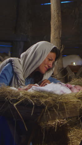 mary and the baby jesus in the manger