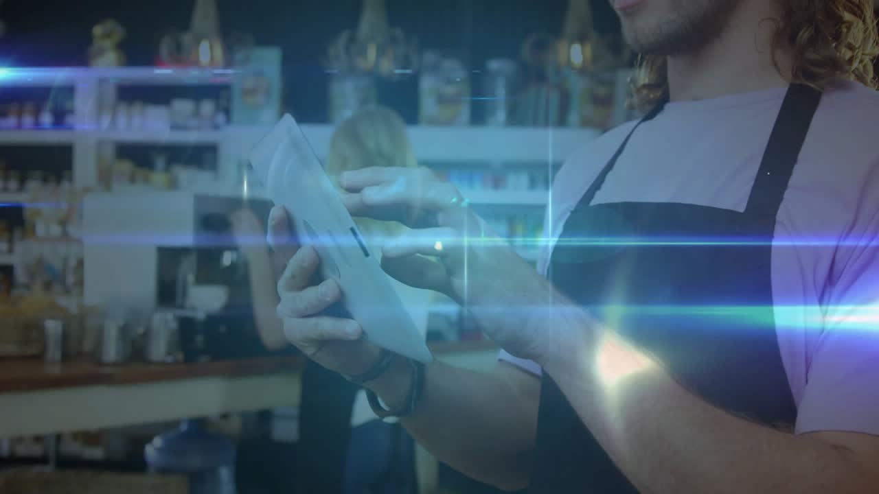 Barista tapping tablet screen at cafe counter, creating growing network map for data visualization