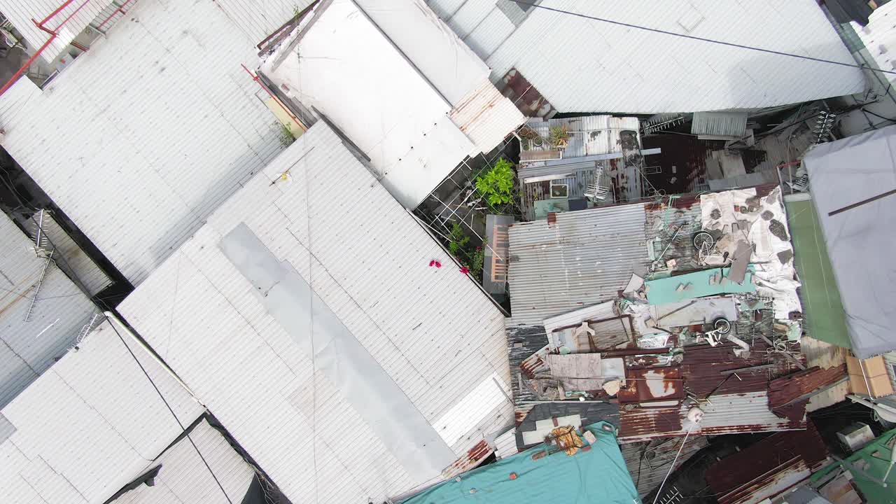 Hong Kong rundown slum houses populated by squatters, in the outskirts of Kowloon bay, Top down aerial view