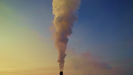 smoke stack emission at sunrise/sunset
