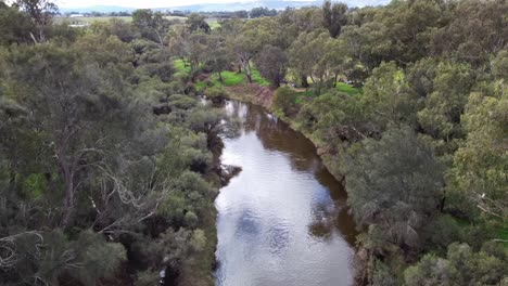 Aerial-View-Over-Calm-River-Scene-Surrounded-By-Trees,-Swan-Valley---Perth-Australia