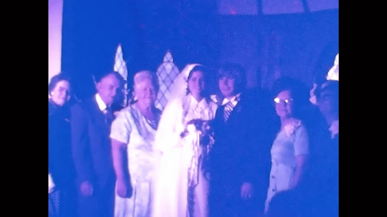 Group of People Standing Together During 1970s in the USA. CIRCA USA - 1970s: Candid archival photograph showing a diverse group of people standing next to each other in the United States during the 1970s.