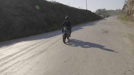 motorcyclist on a scenic mountain road