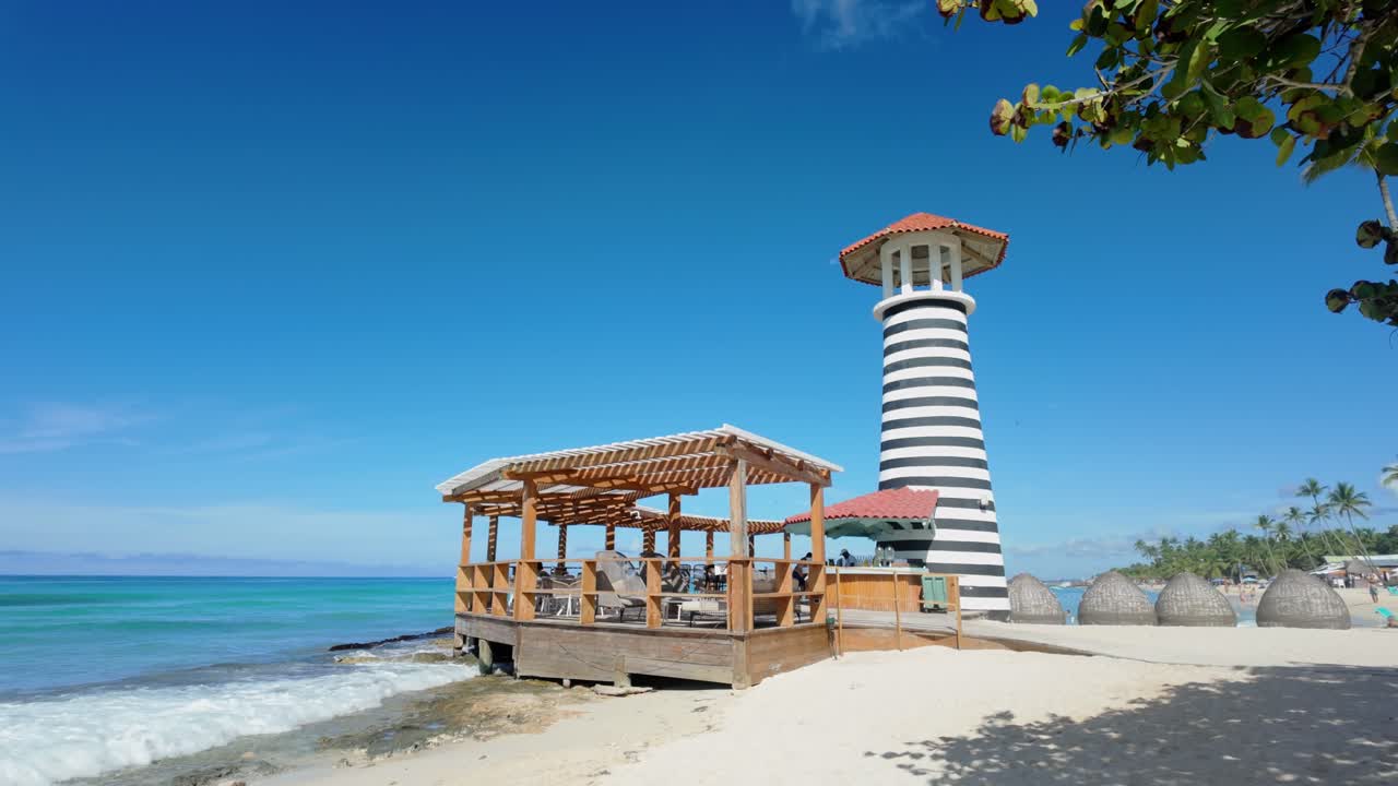 Beautiful Beach with Lighthouse and Bar in the Caribbean