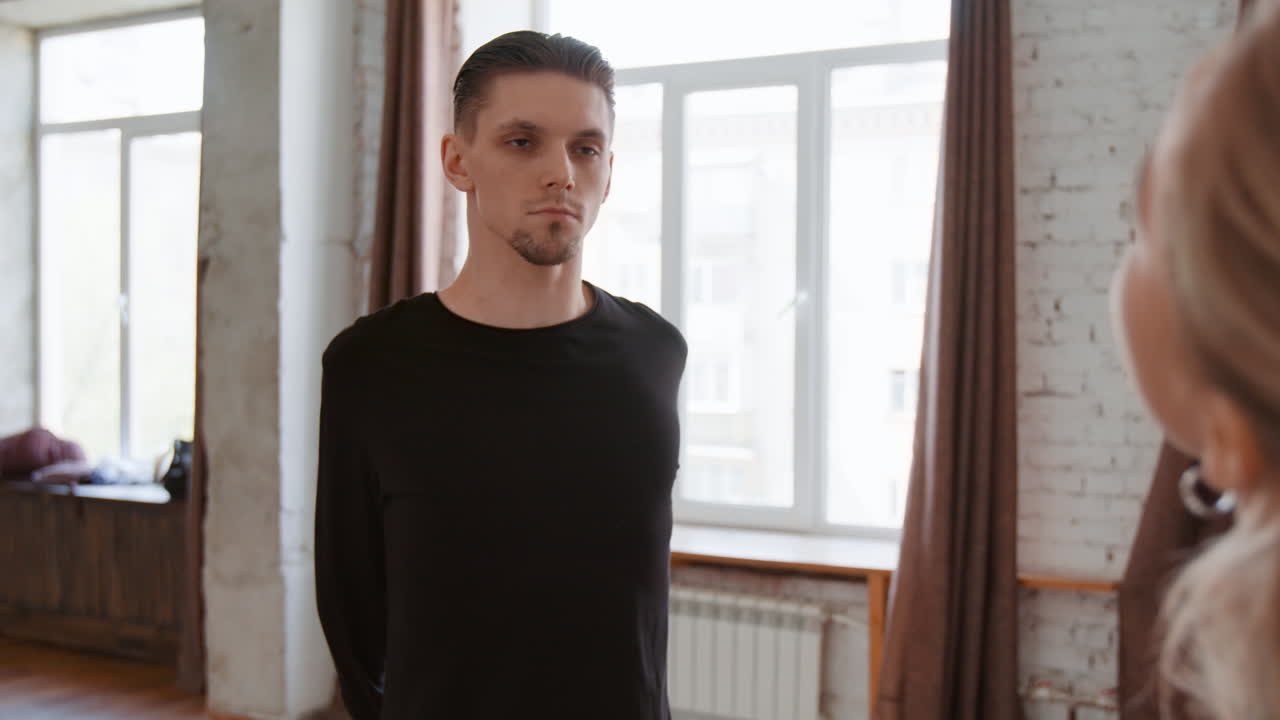 Man training and rehearsing in a dance studio