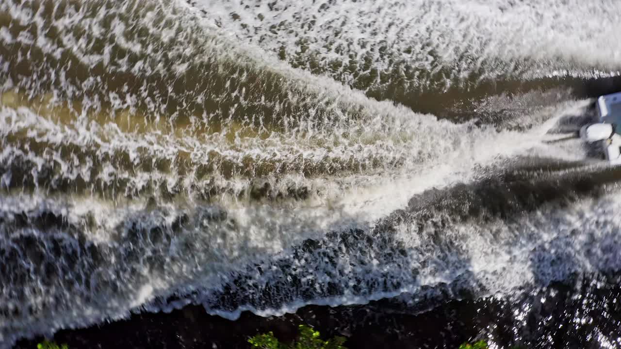 Aerial Low Above Tourists Sat in Speedboat Cruising Along El Morro National Park Mangrove Forest Waterway, Montecristi, Dominican Republic