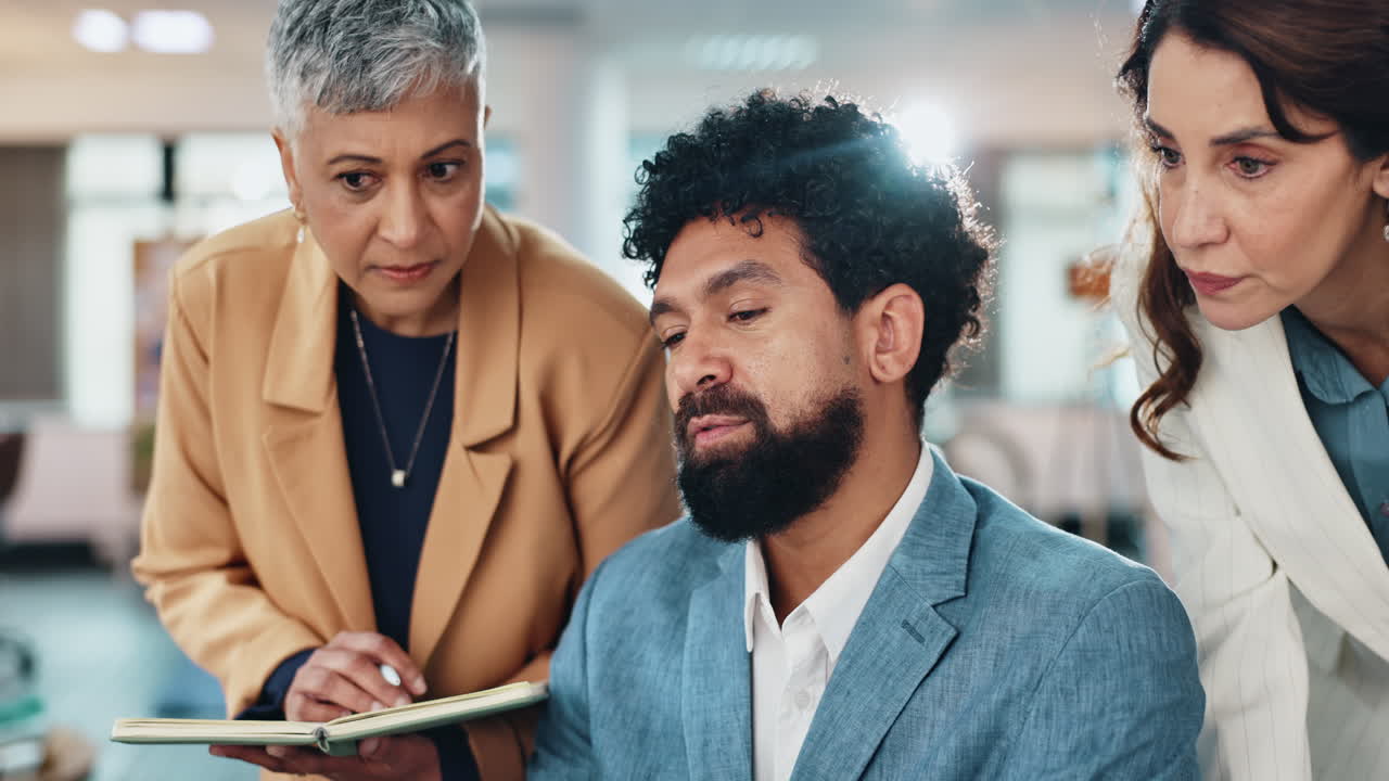 Three Business People in an Office Meeting