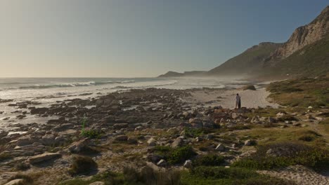 Sunset-beach-view-at-Scarborough-near-Cape-Town-with-a-person-looking-at-the-sea