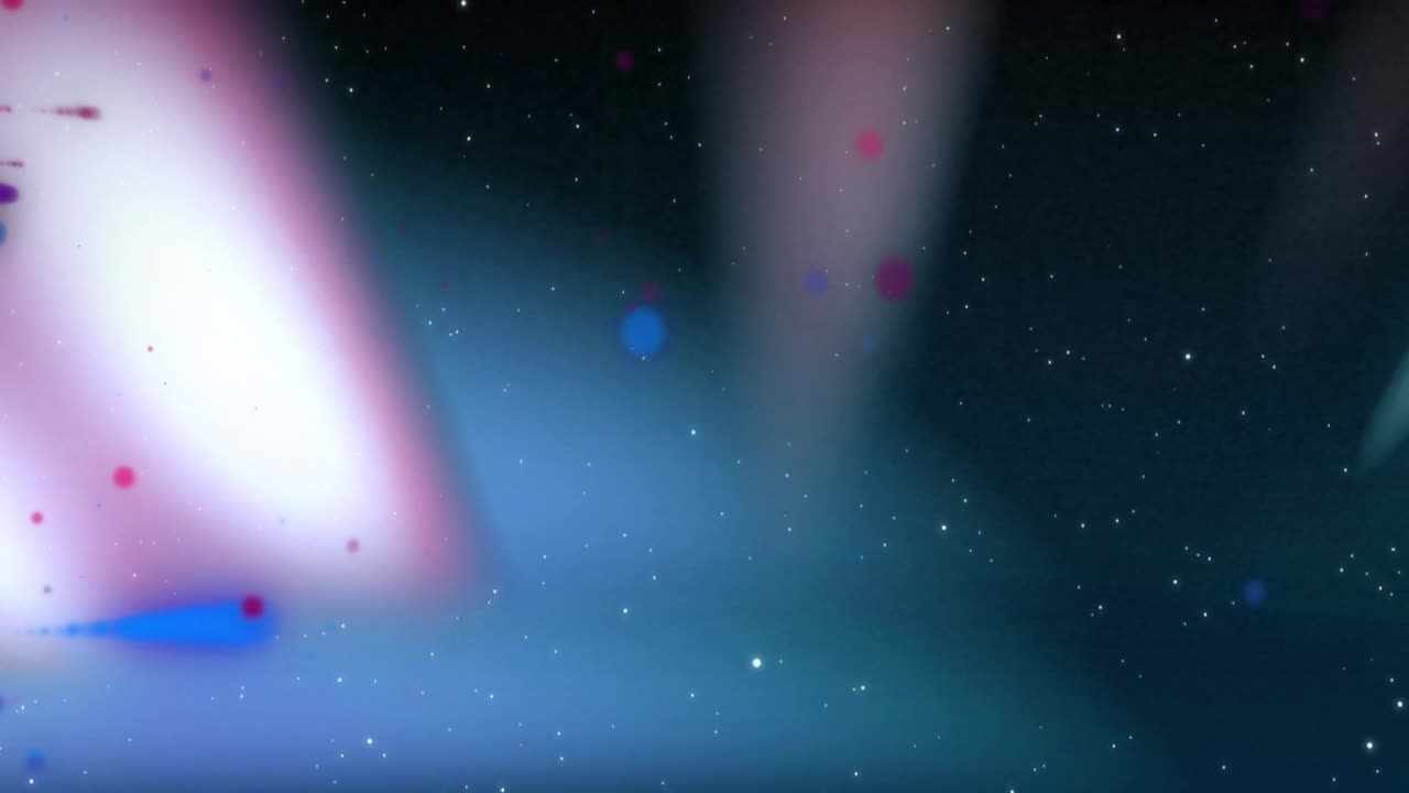 Animation of glowing light spots and trails moving over black background