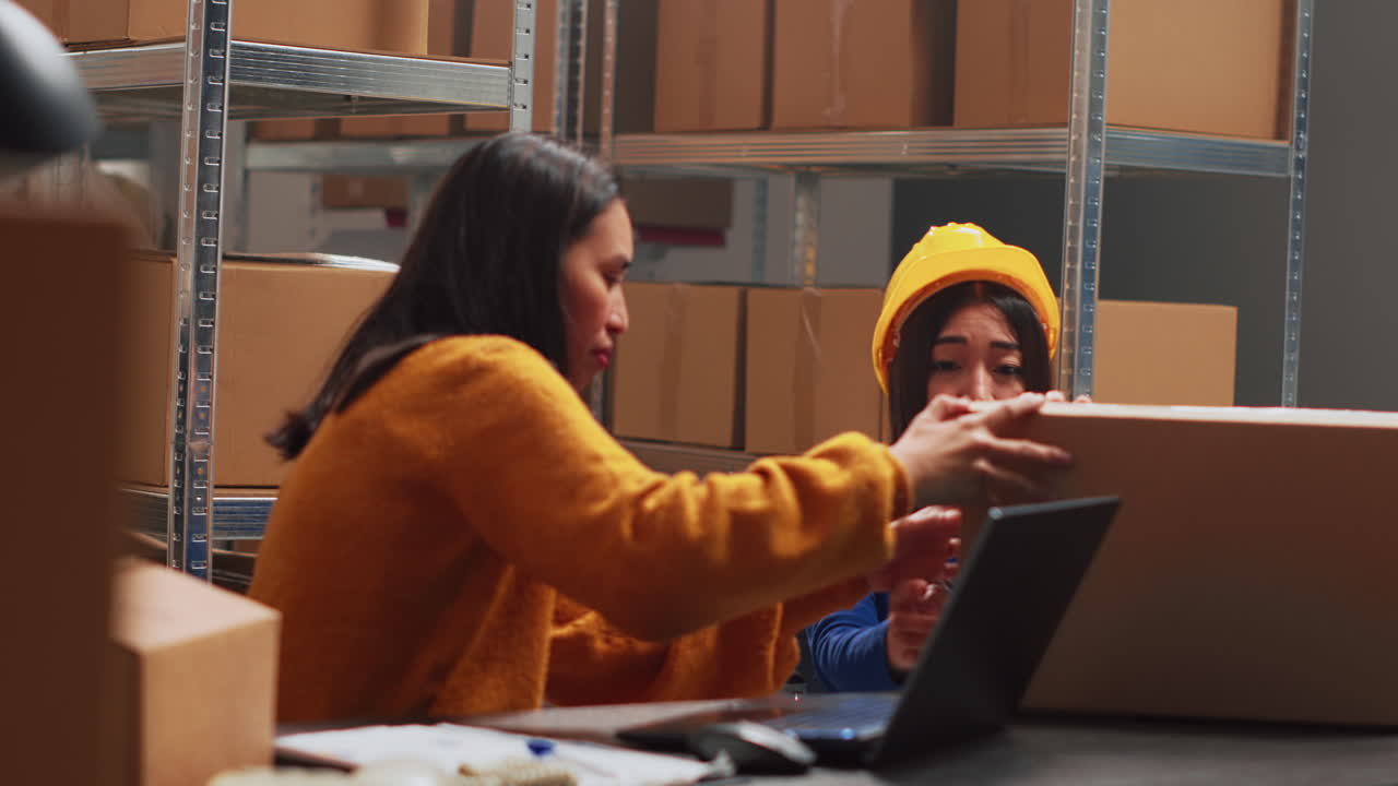 Warehouse workers processing orders