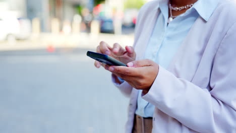 City,-phone-and-woman-hands-typing