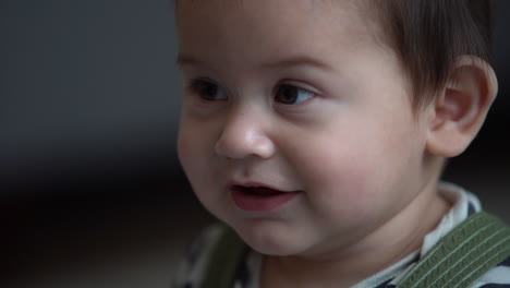 close up of hispanic baby smiling happy