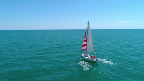 yacht sailing in open sea. aerial view of yacht sailing in the bay
