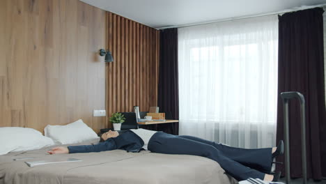 businesswoman resting in hotel room