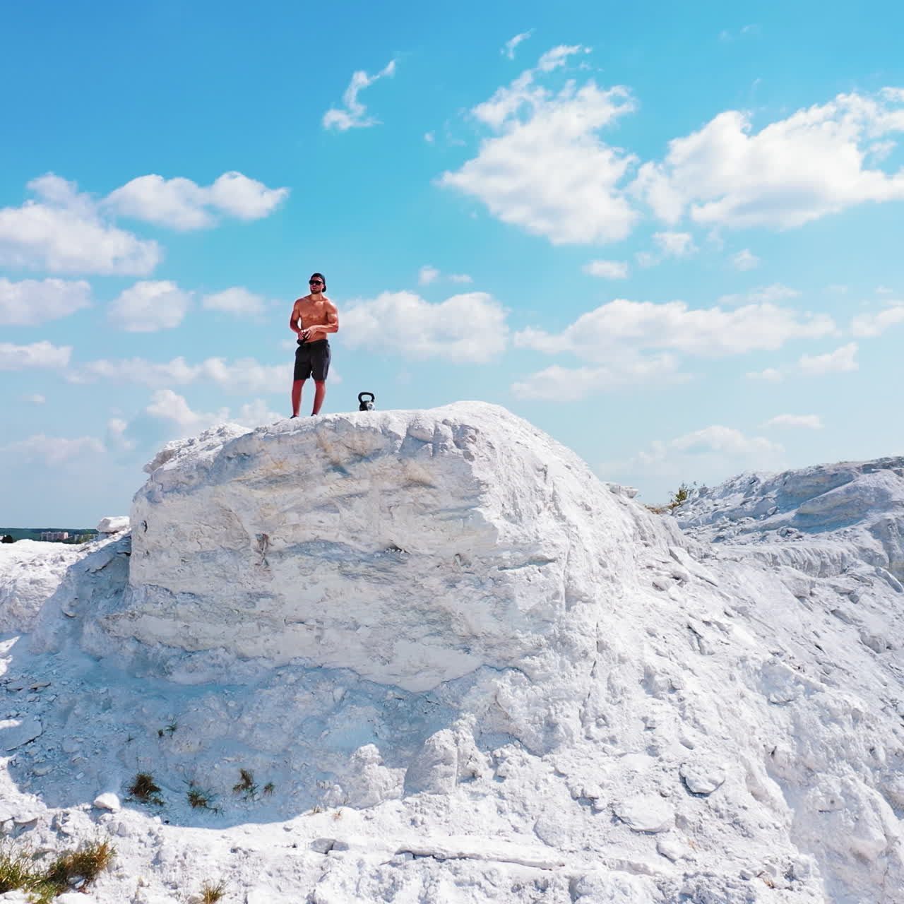 Man Working Out on a Hilltop