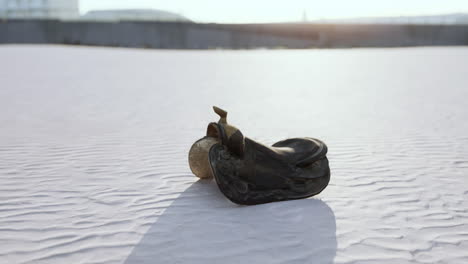 old-horse-saddle-on-the-beach