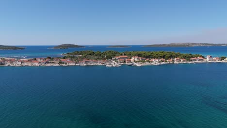 island of krapanj and brodarica village aerial panoramic coastline view, marina, houses and buildings sea sponge harvesting island, sibenik archipelago of dalmatia croatia