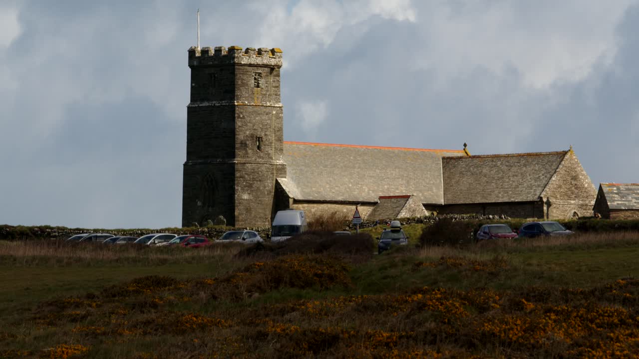 Wide shot of St Materiana's Church, Tintagel, with Cloud shadow, moving over roofline