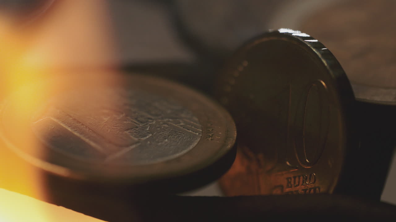 monedas de euro en llamas