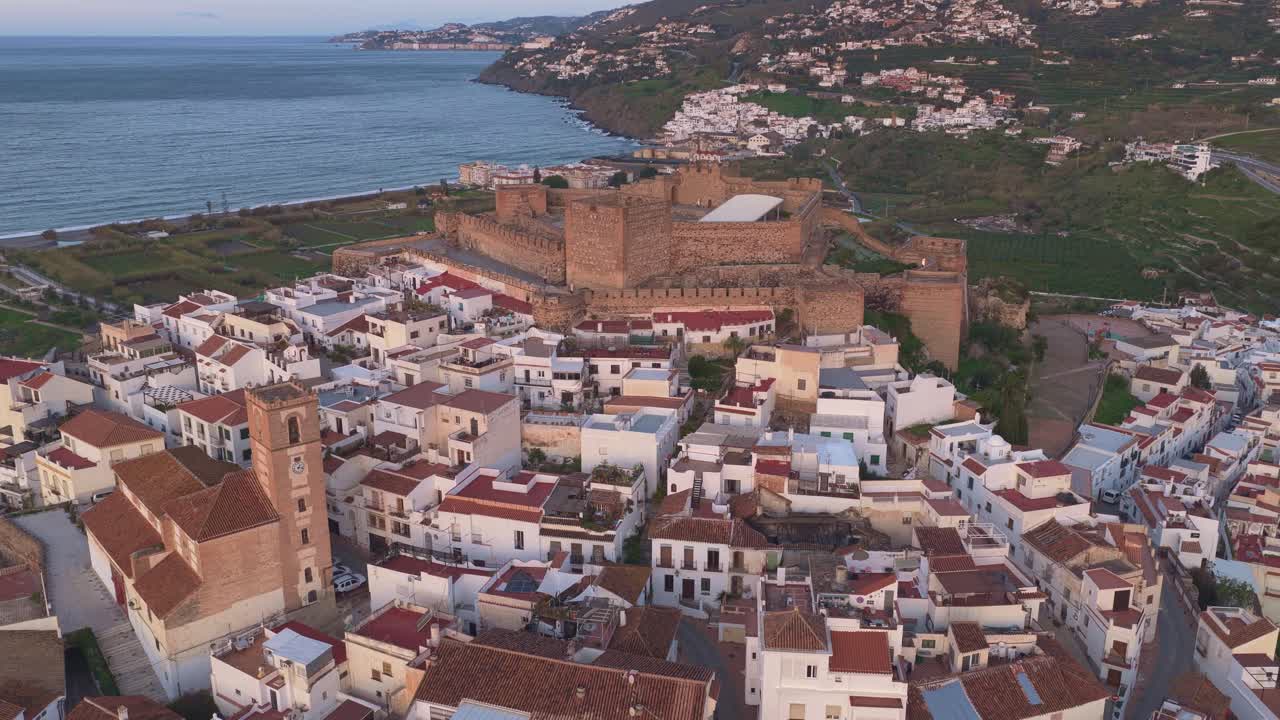 Aerial view of salobrena's castle and old town at sunset