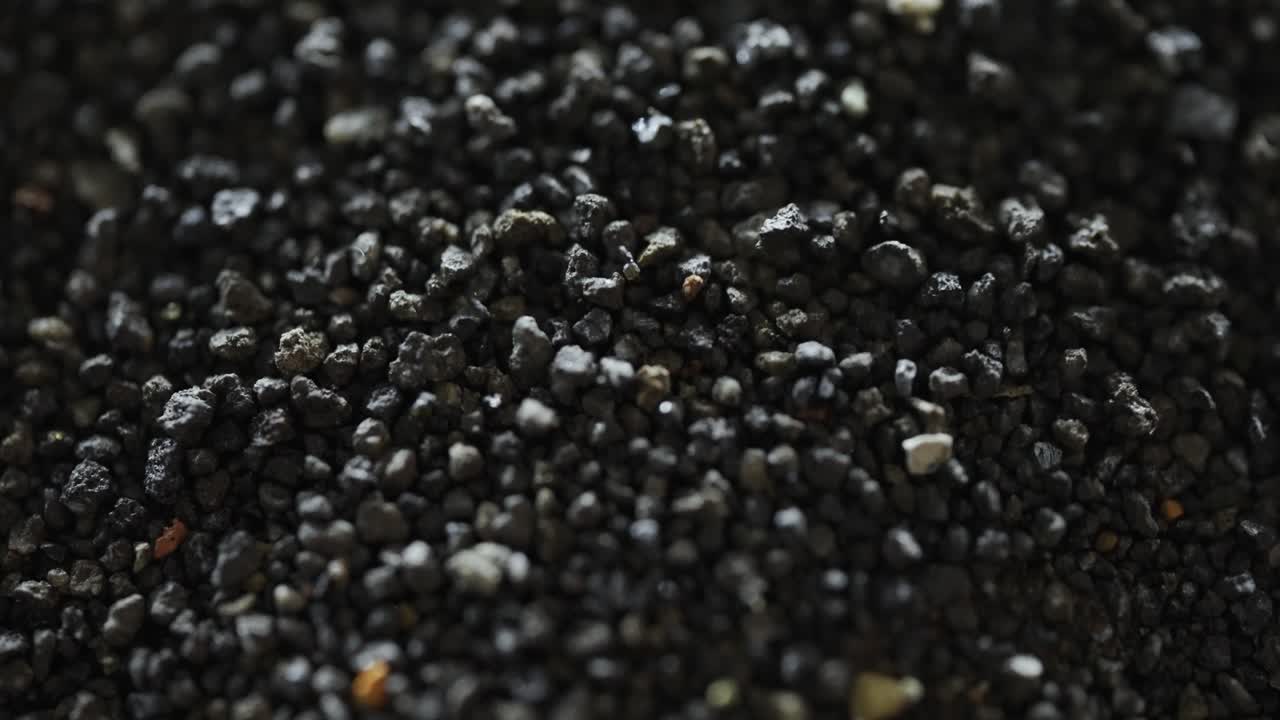 Black Rocky Macro Terrain Reacting To Magnetic Attraction