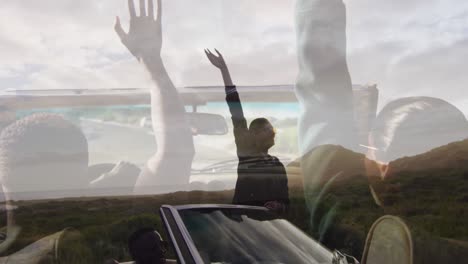 animación de una feliz pareja caucásica en un coche sobre otra pareja y el paisaje
