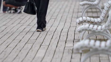 person walking on weathered boardwalk, no face 4k