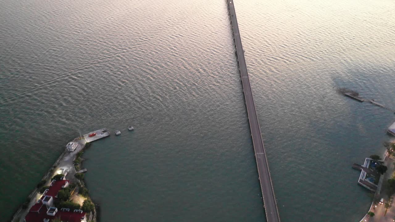 Aerial tilt up shot of the Zacatal Bridge in Ciudad del Carmen, Mexico.