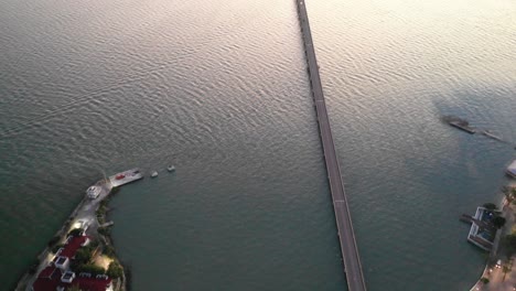 aerial tilt up shot of the zacatal bridge in ciudad del carmen, mexico.