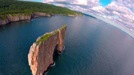 aerial view of rugged coastline and unique rock formation