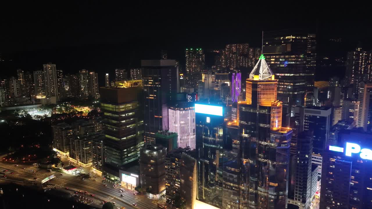 Hong Kong Night Skyline: Aerial View of Skyscrapers and City Lights