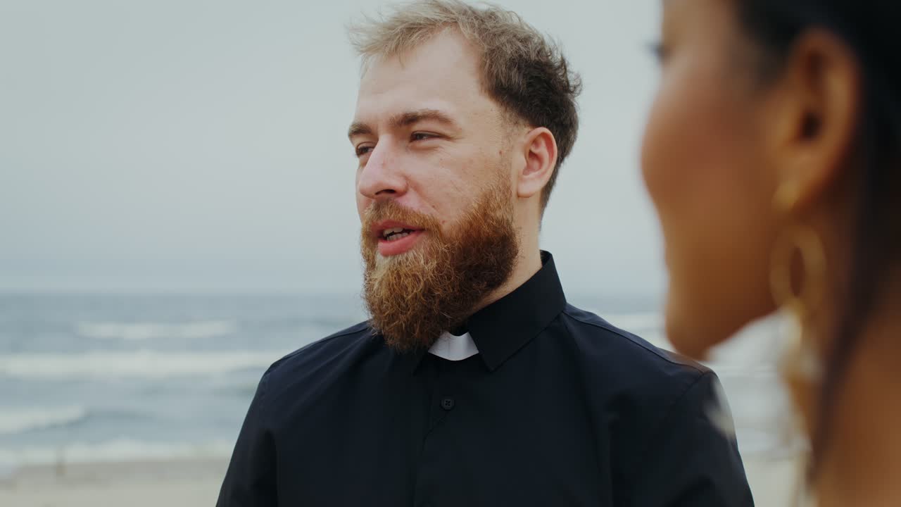 Wedding Ceremony on the Beach with Priest Officiating