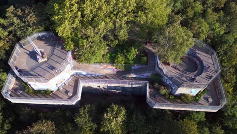 Smooth-aerial-top-view-flight-Flak-tower-Humboldthain-Bunker-World-War-2,-Berlin-mitte-summer-2023