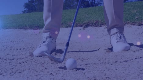 Animation-of-light-spots-over-senior-caucasian-man-playing-golf-on-golf-course