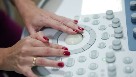 Doctor operating an ultrasound machine
