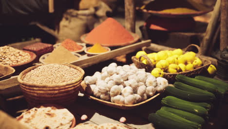 vibrant display of spices and vegetables at an old national african market