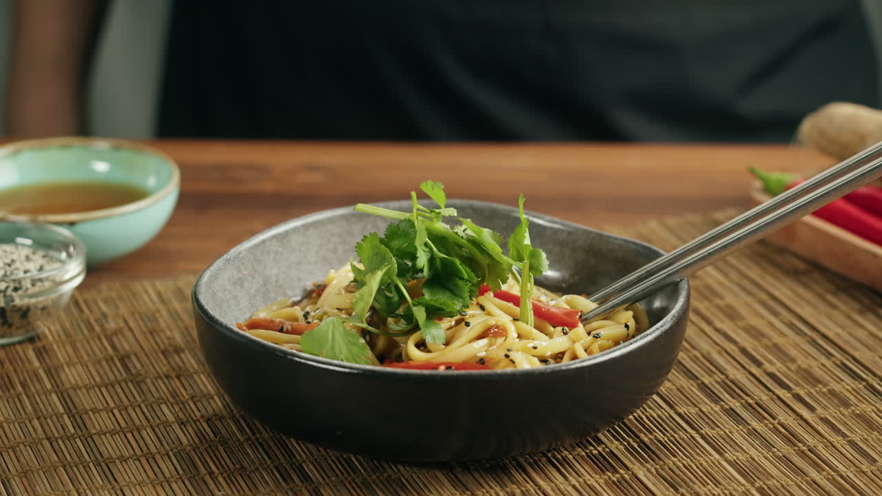 Preparing noodle dish