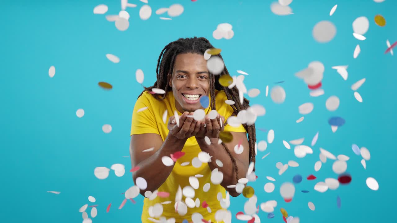Man celebrating with confetti