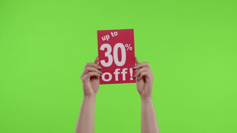 Up-To-30-Percent-Off-advertisement-inscription-on-paper-sheet-in-womans-hands-on-chroma-key