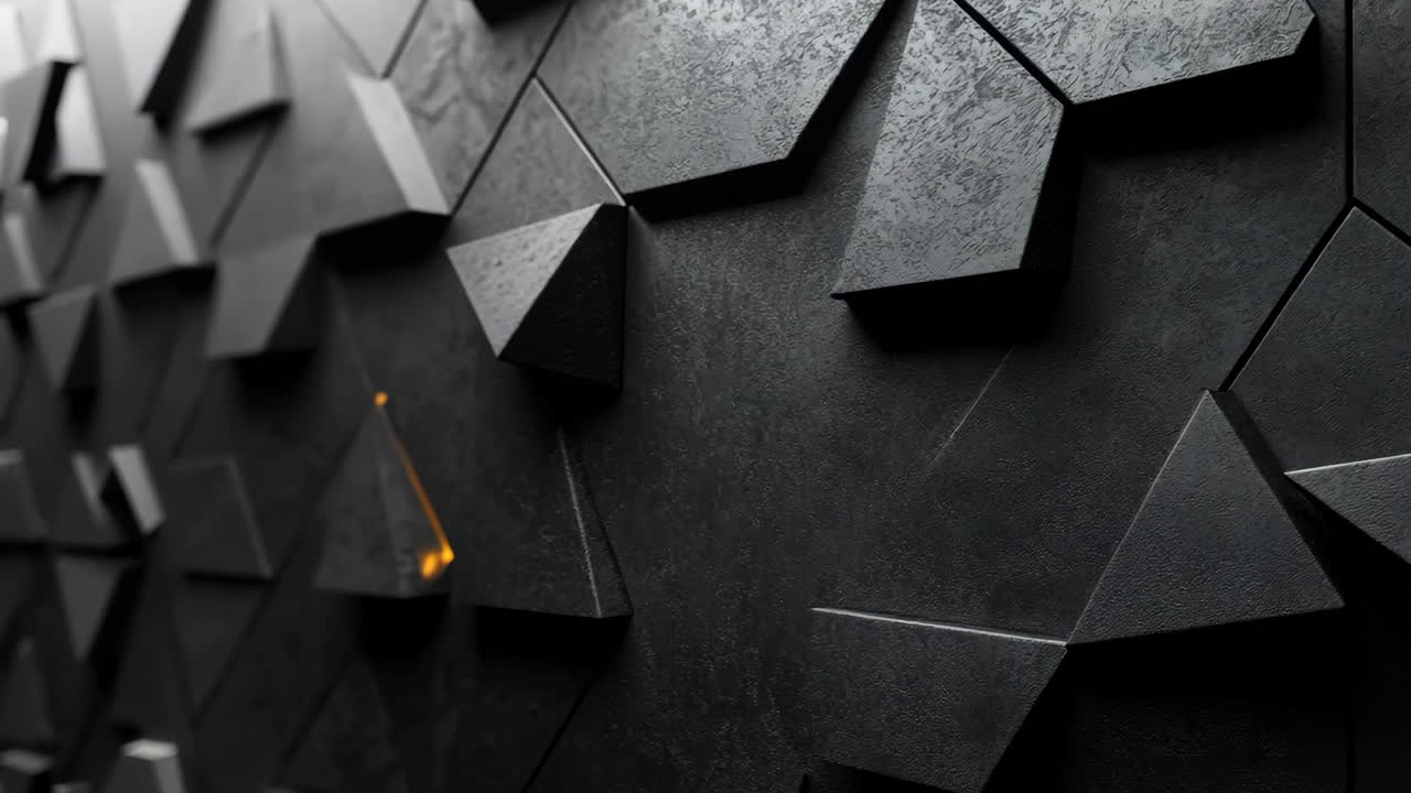 A black and white photo of a wall with many triangles. The photo is abstract and has a modern feel to it