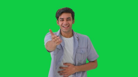 Cute-Indian-boy-laughing-and-making-fun-Green-screen