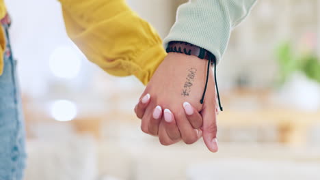 couple, closeup and people holding hands for love